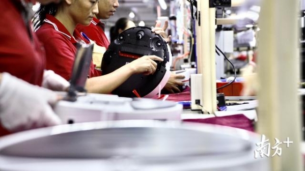 国产手机全球疯抢，广东加工贸易满血复活的秘诀是？|经济粤评-9.jpg