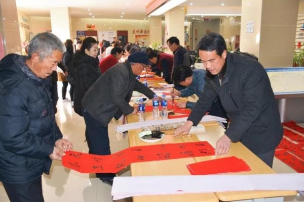 传统年 在新区——送春联 订年画 逛花市-4.jpg