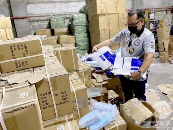 菲律宾海关局查获价值上亿走私口罩及面罩-1.jpg
