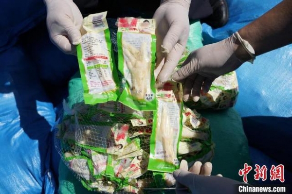 境外生产伪装国内商品 南宁海关查获涉嫌走私即食鸡爪逾37吨-1.jpg