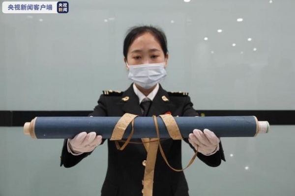 保护野生动物！大连周水子机场海关截获象牙画轴-1.jpg