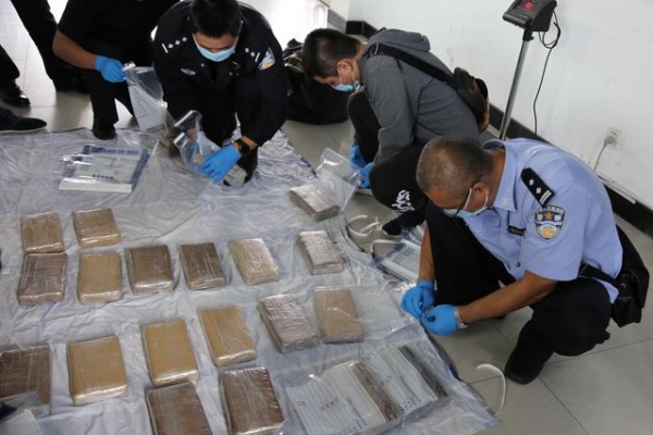 致敬首个“中国人民警察节”——青岛海关2020年侦办走私犯罪案件创历史新高-5.jpg