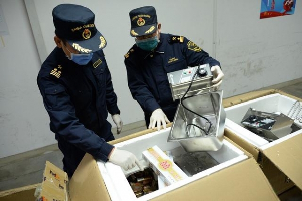 广州海关查获3批涉嫌走私出口香烟-1.jpg